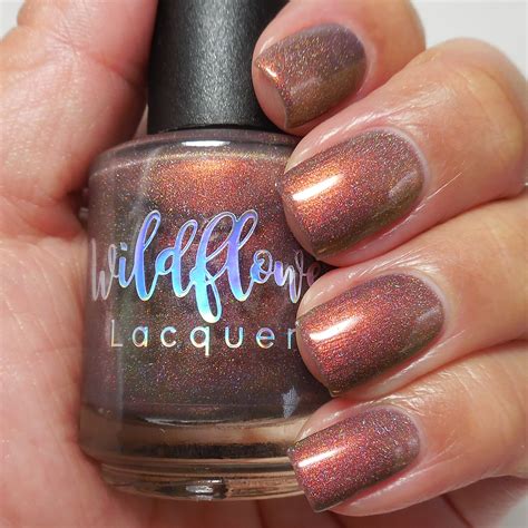 Wildflower Lacquer will warm your vampy purple-loving heart this month sent by the maker for photography and review Wildflower Lacquer Horrific Harlequins is a very dark plum jelly with magenta shimmer, red-to-gold multichrome flakes, blue, purple, aqua, and holo microflakes. . Wildflower lacquer